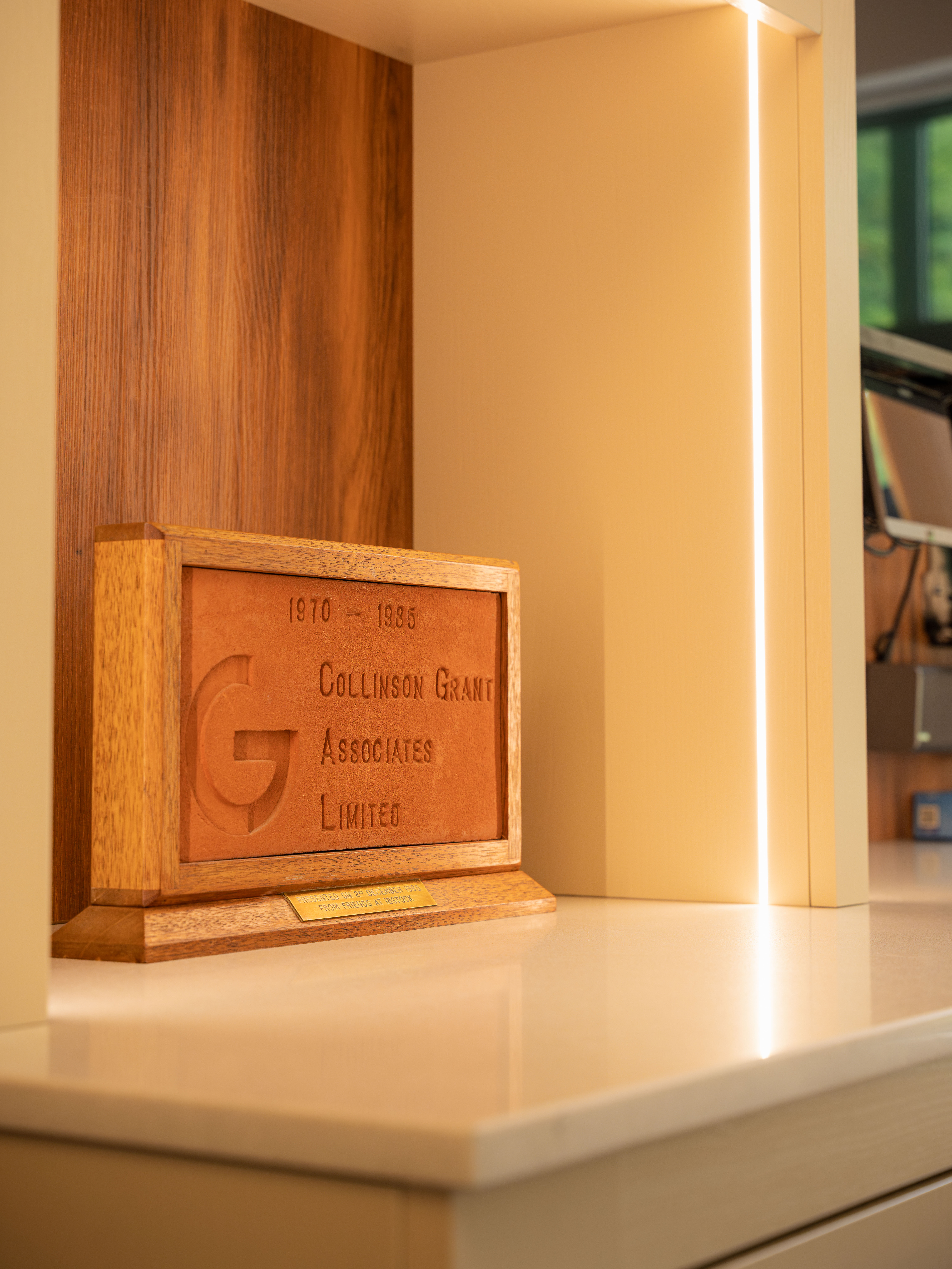 Company heritage building bricks foundation — Collinson Grant boardroom by Hafferty Interiors Worsley