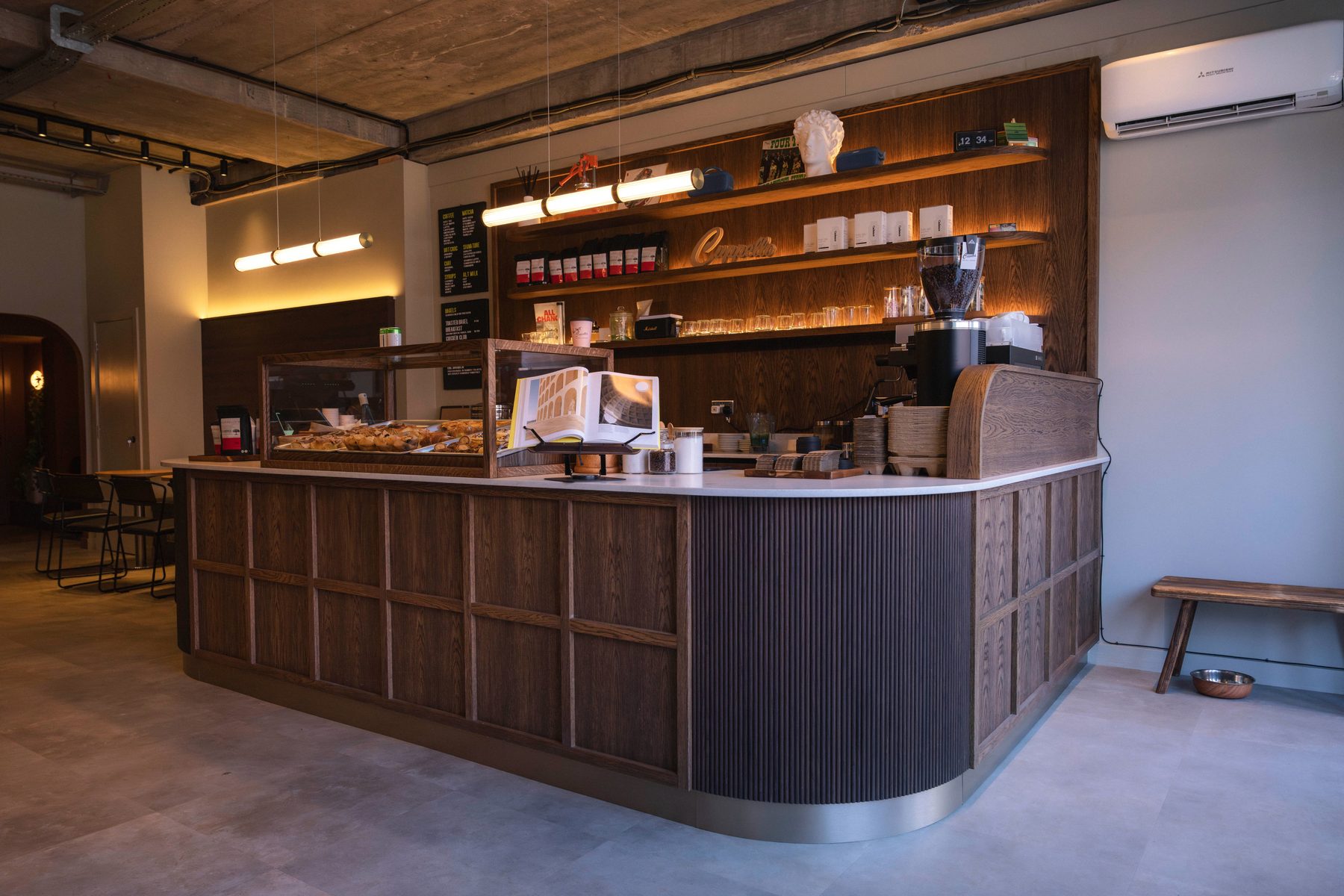 Bespoke coffee shop fit-out Manchester — Cuppellos modern warmth glow by Hafferty Interiors