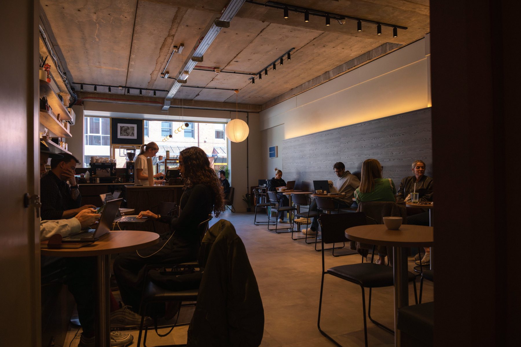 Social workplace combined — Cuppellos coffee shop fit-out Manchester by Hafferty Interiors