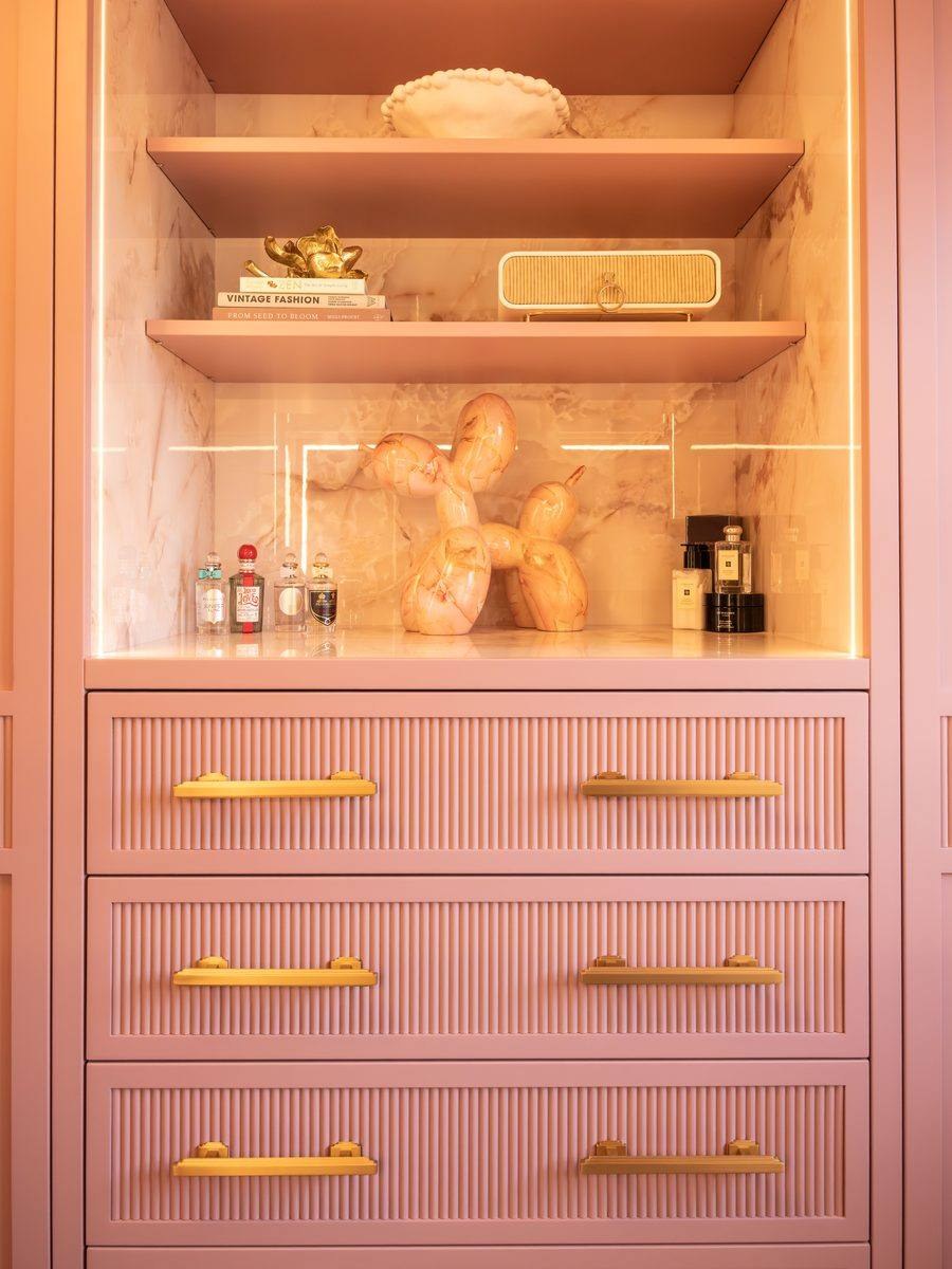 Bespoke fitted dressing room with full-length mirror and custom shelving — Hafferty Interiors