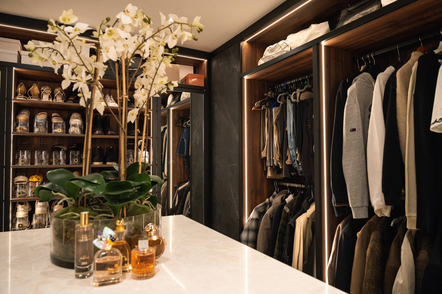 Bespoke walk-in wardrobe and dressing room by Hafferty Interiors Manchester