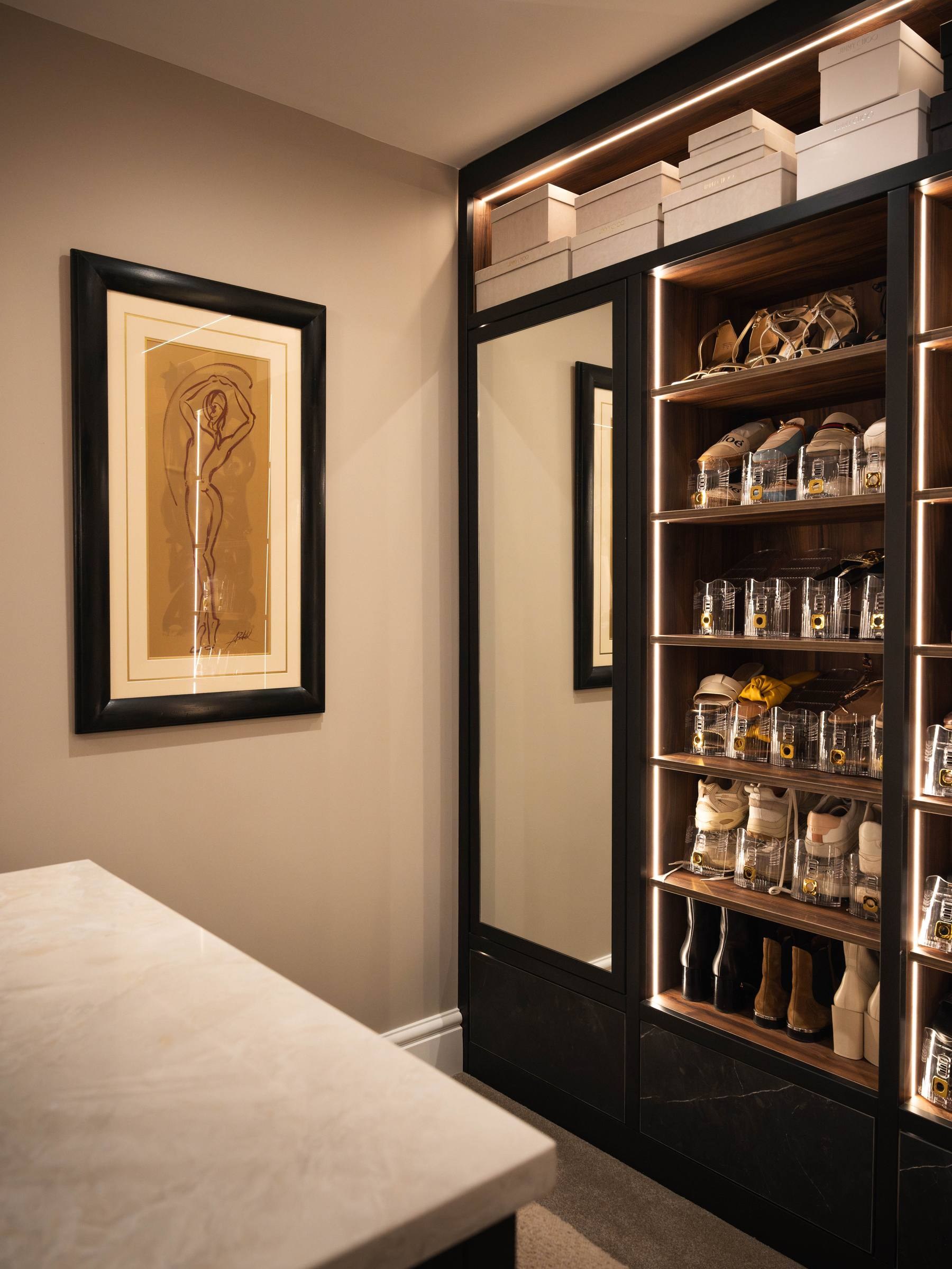 Bespoke walk-in wardrobe and dressing room by Hafferty Interiors Manchester