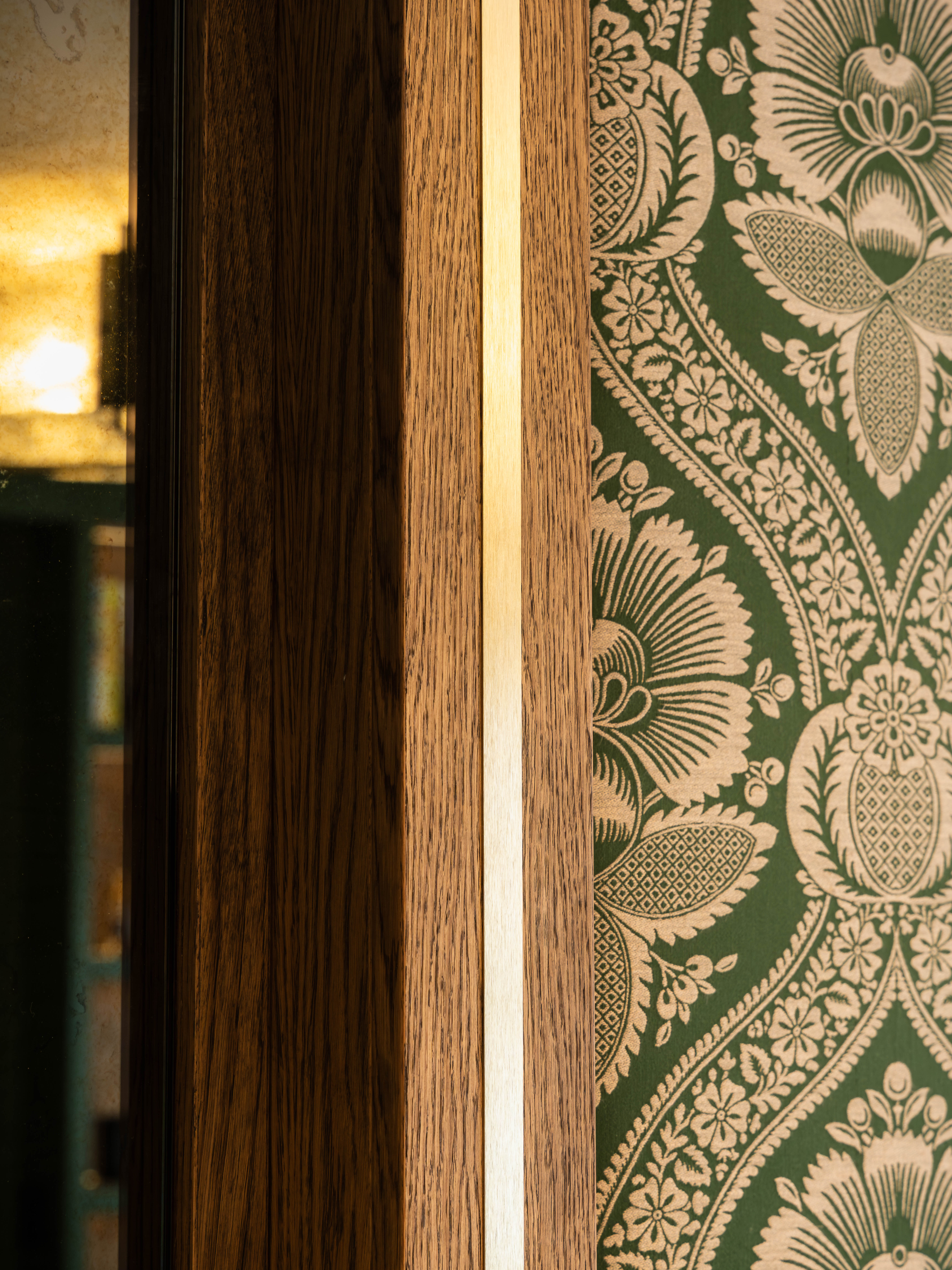 Brass designer fabric headboard — bespoke fitted master bedroom Manchester by Hafferty Interiors