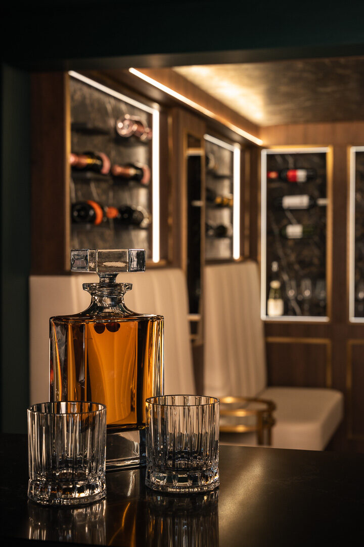 Integrated LED plinth lighting in bespoke home bar Worsley — Hafferty Interiors