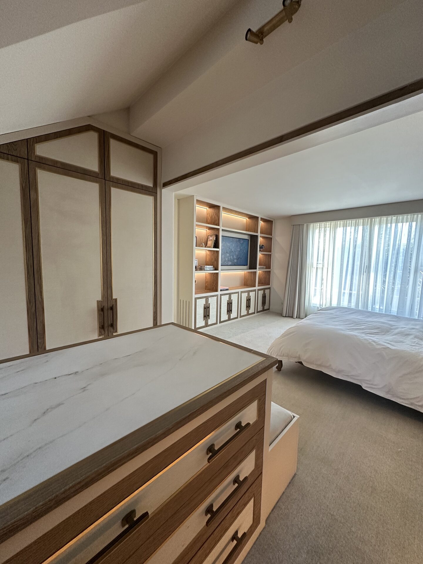 Full-height wardrobe joinery detail — bespoke master suite by Hafferty Interiors Manchester