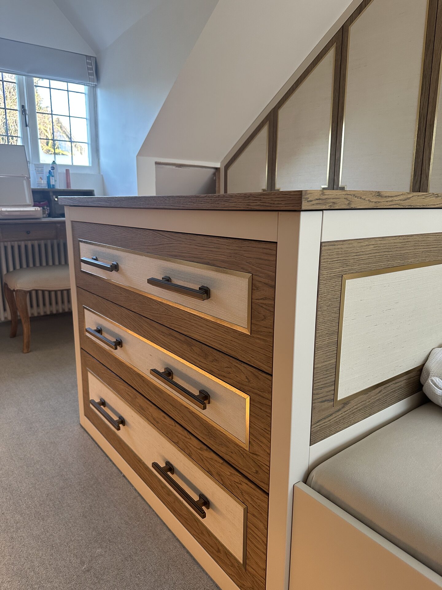 Central detailed island in bespoke master suite wardrobe — Hafferty Interiors Manchester
