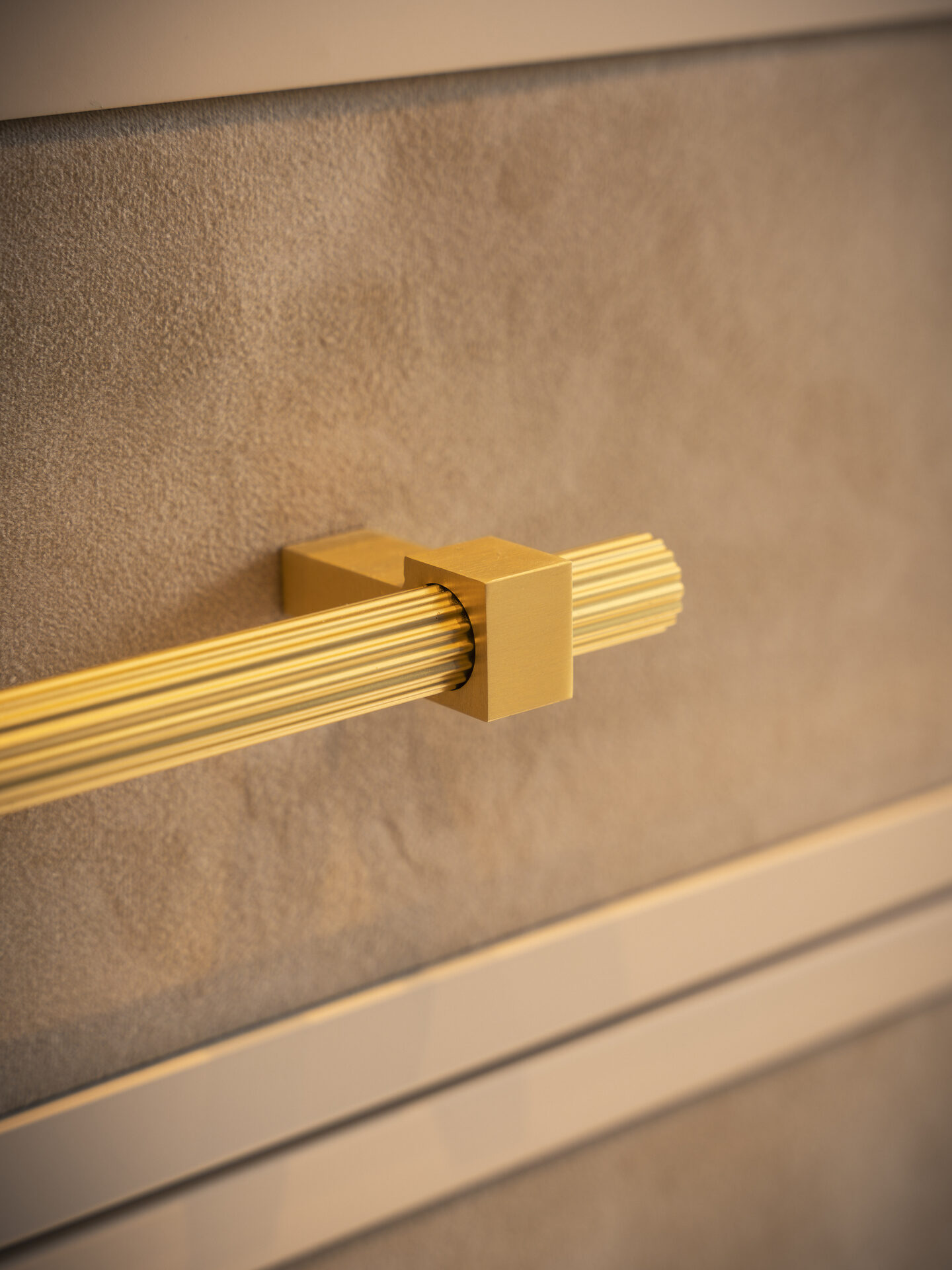 Brass handles and velvet inlay drawers — luxury wardrobe detail by Hafferty Interiors Manchester